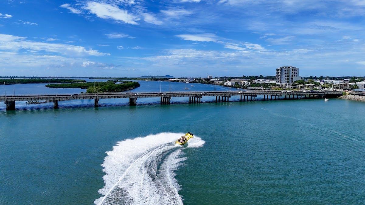 Aerial image of 360 spin near bridge