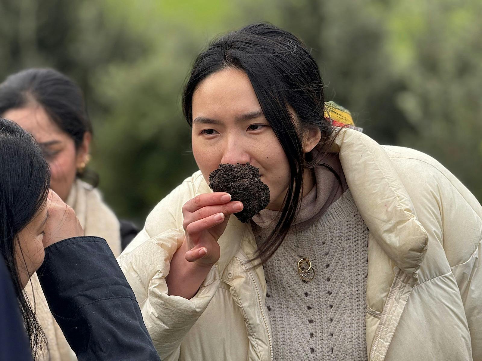 Guest Smelling a fresh black truffle during a Truffle & Flames experience at Scotch Hill