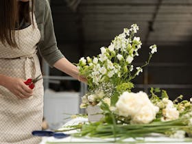 Lady arranging flowers