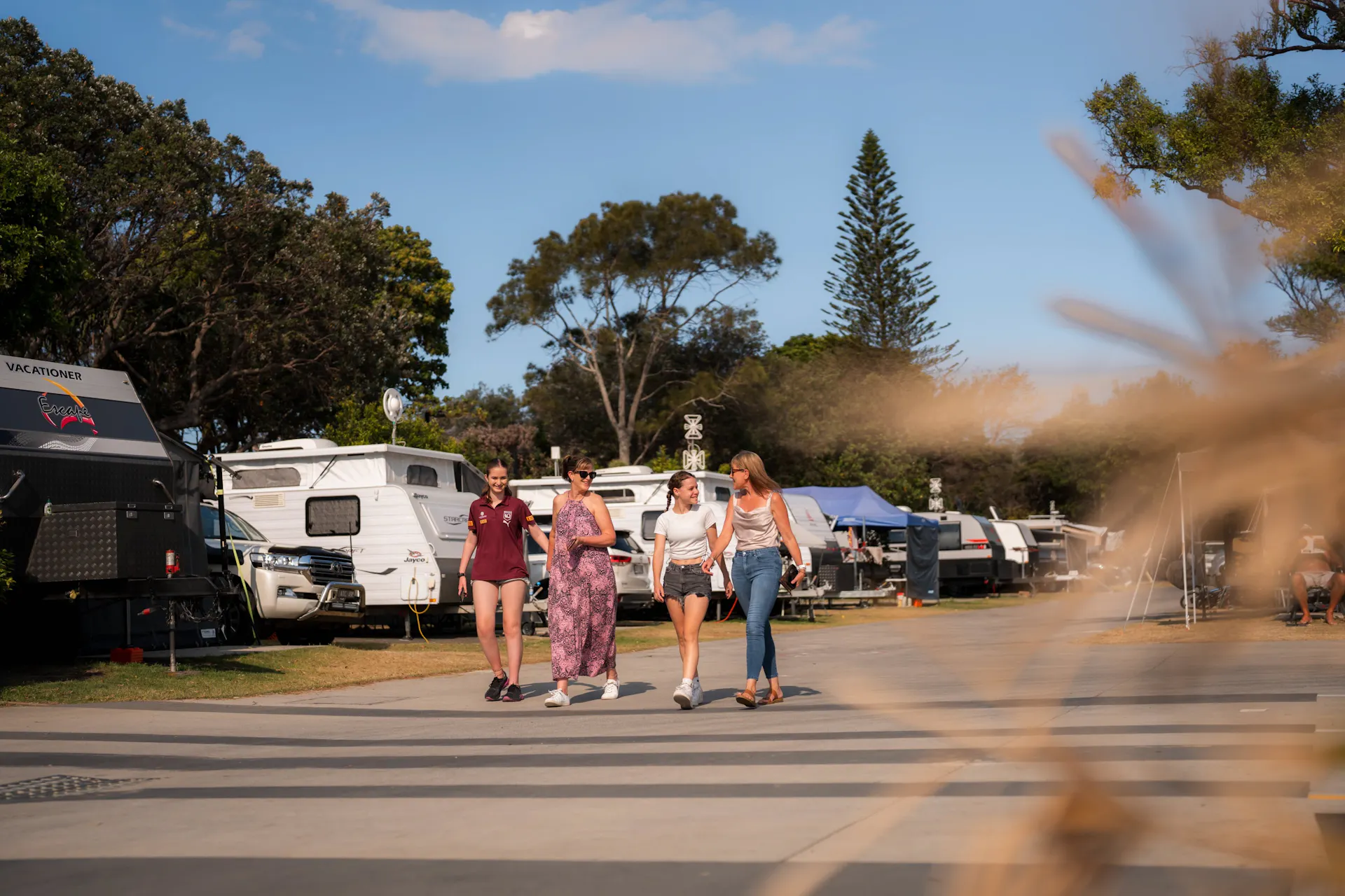 Shot of a family walking through the park