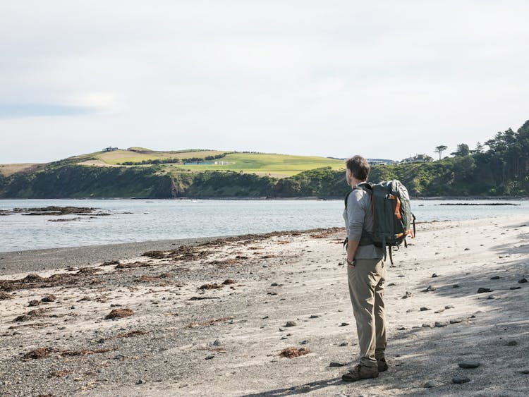 Man hiking on beach