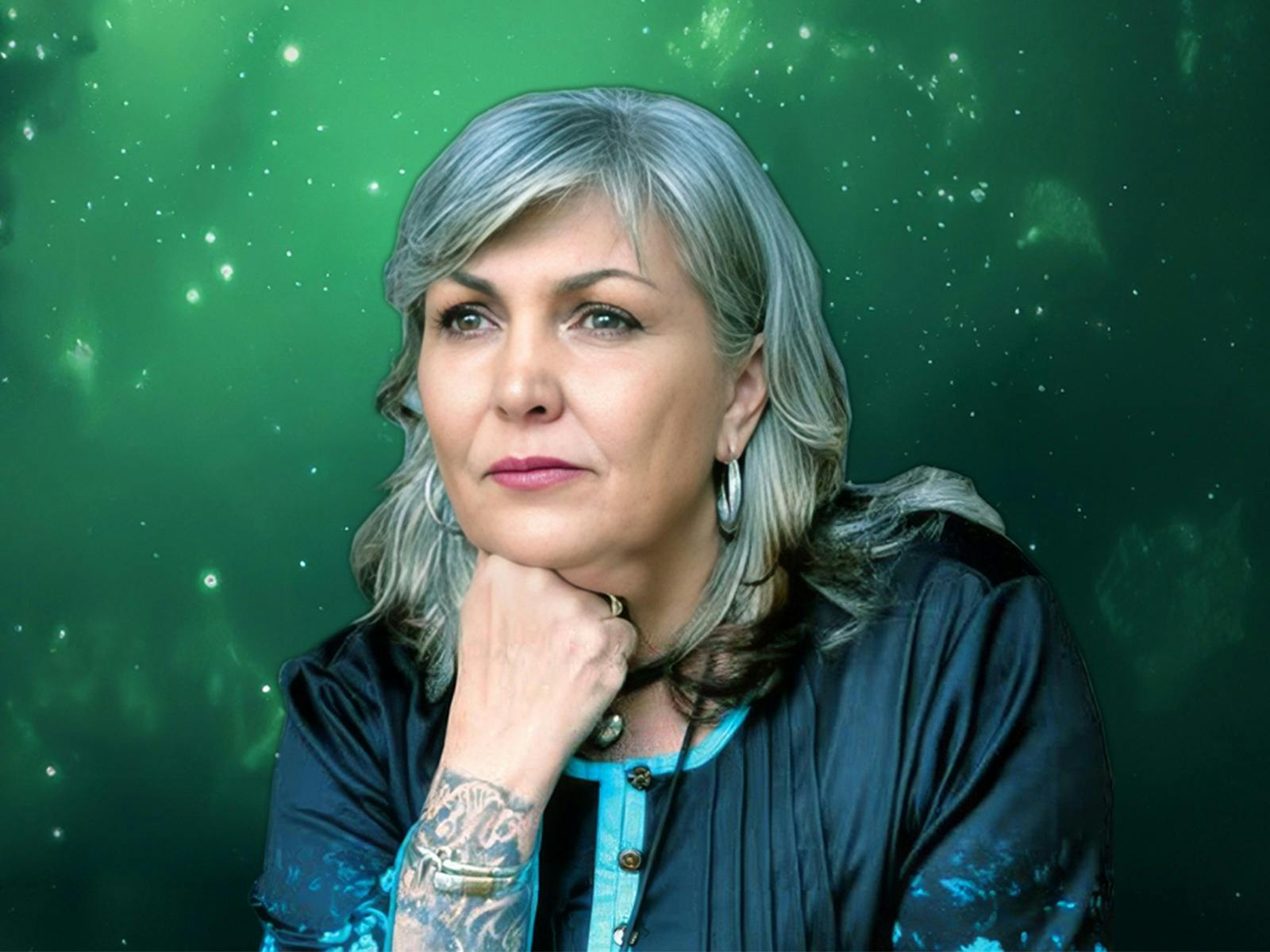 Charmine Wilson on a green background