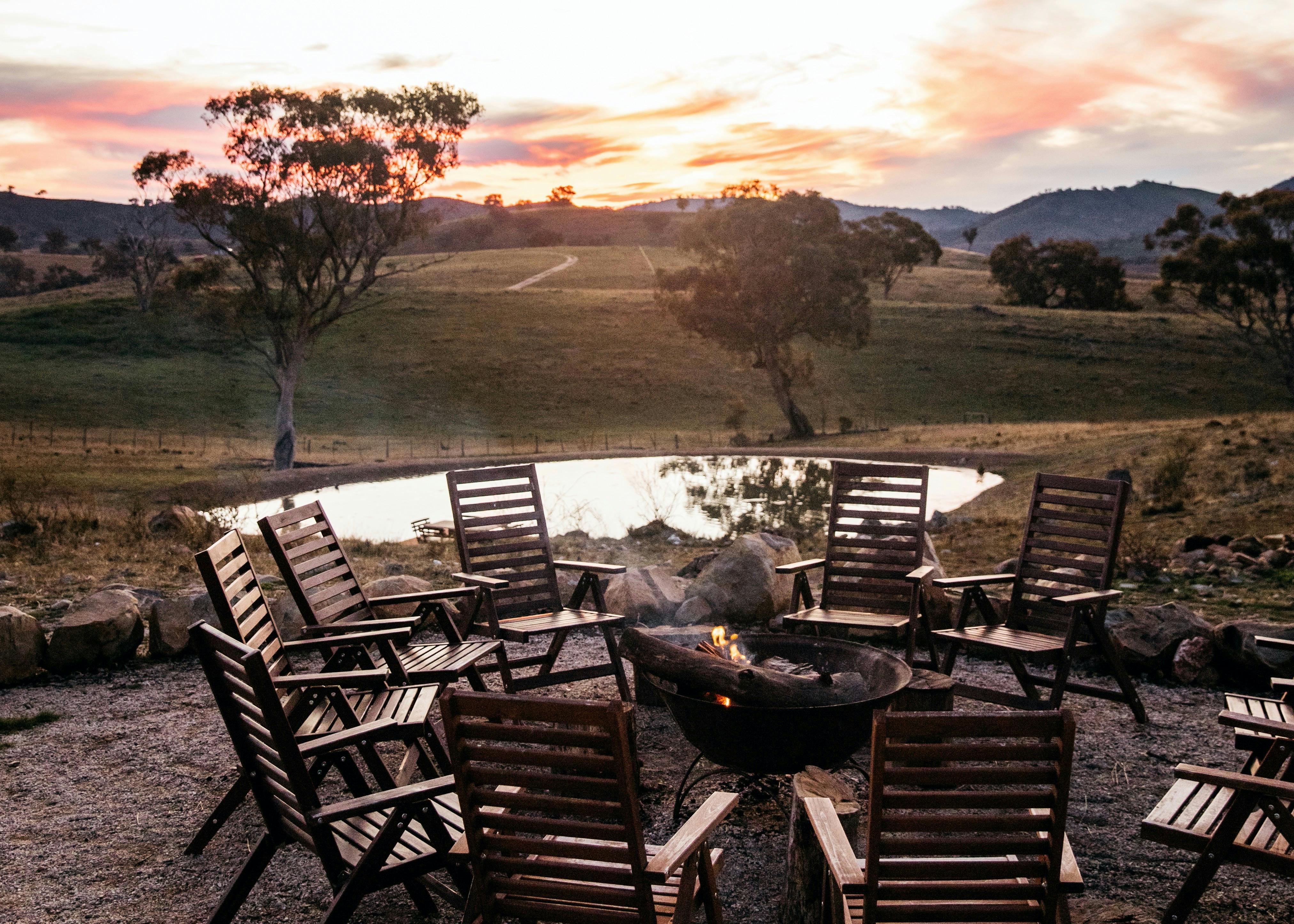 Our glamping fire pit enjoys spectacular views taking in the distant rolling hills and our dam