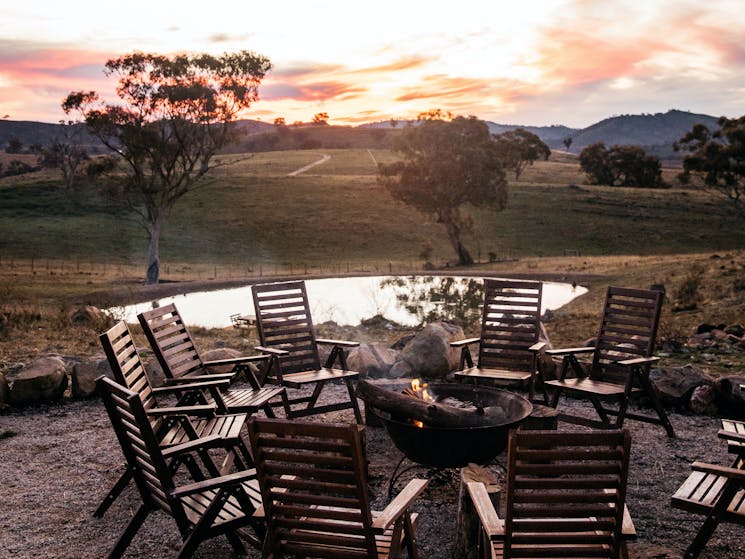 Our glamping fire pit enjoys spectacular views taking in the distant rolling hills and our dam