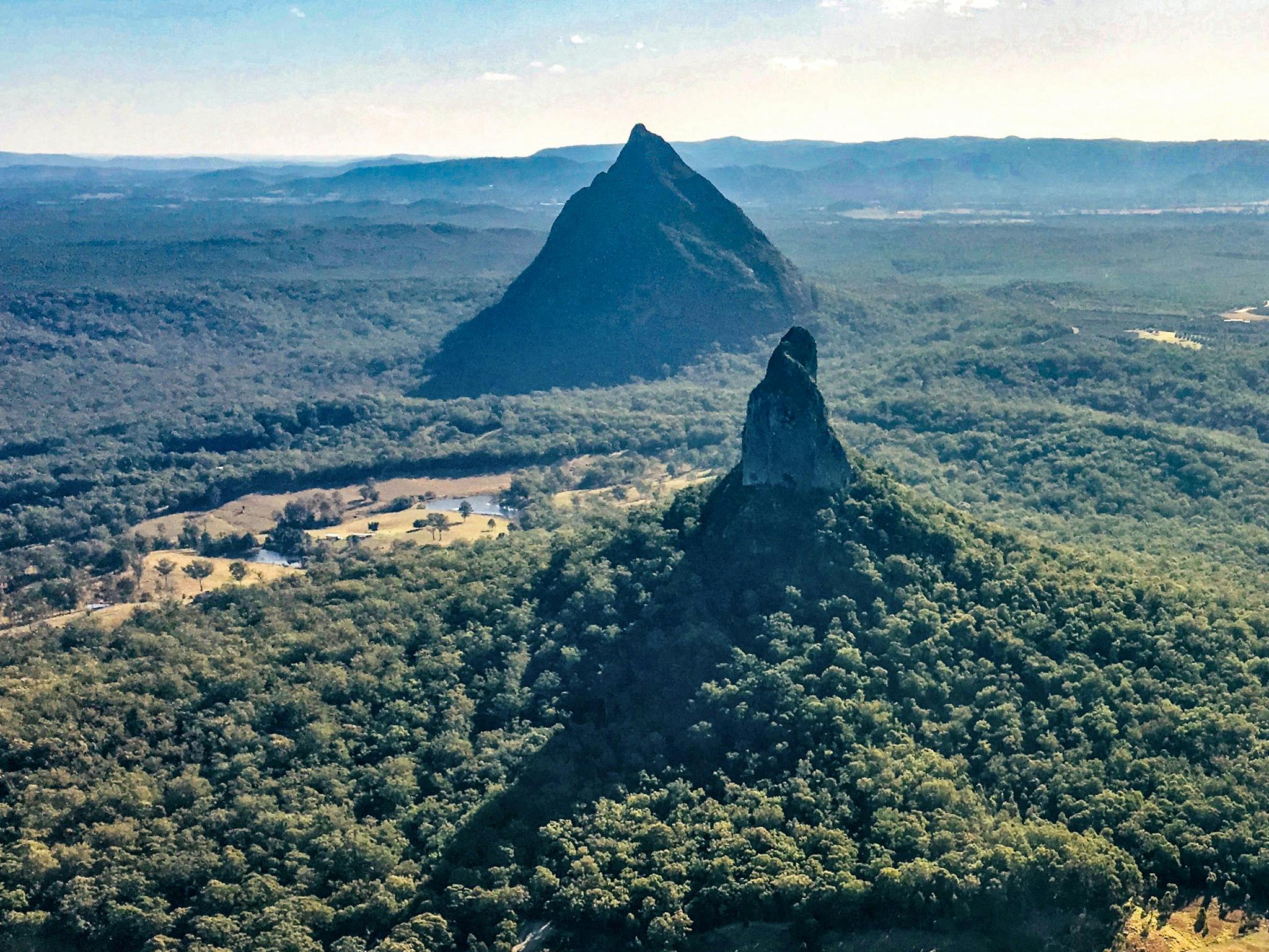 View of Glasshouse Mountains from Seaplane. Mt Crookneck in foreground.