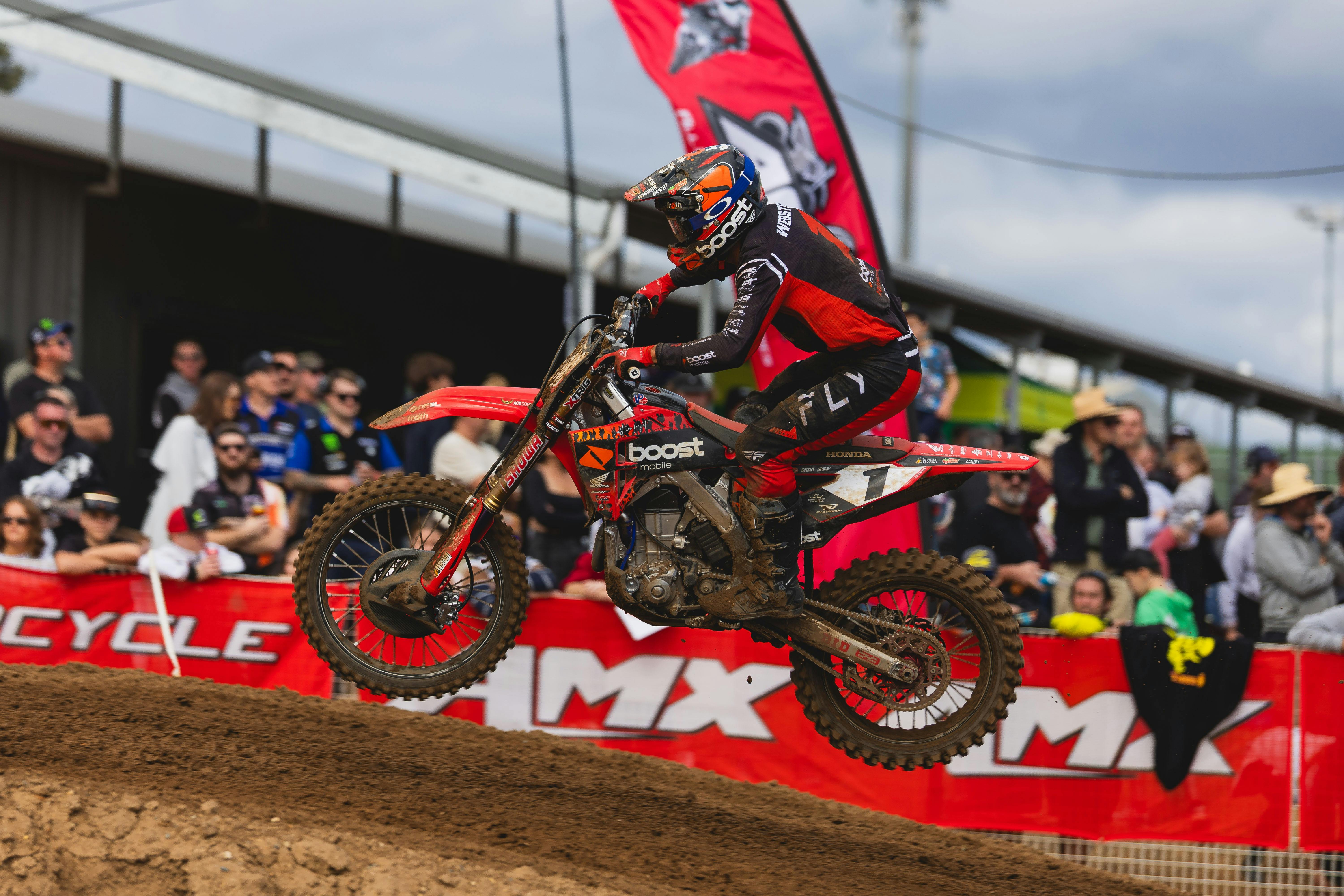 MX1 Rider Kyle Webster jumps through the air