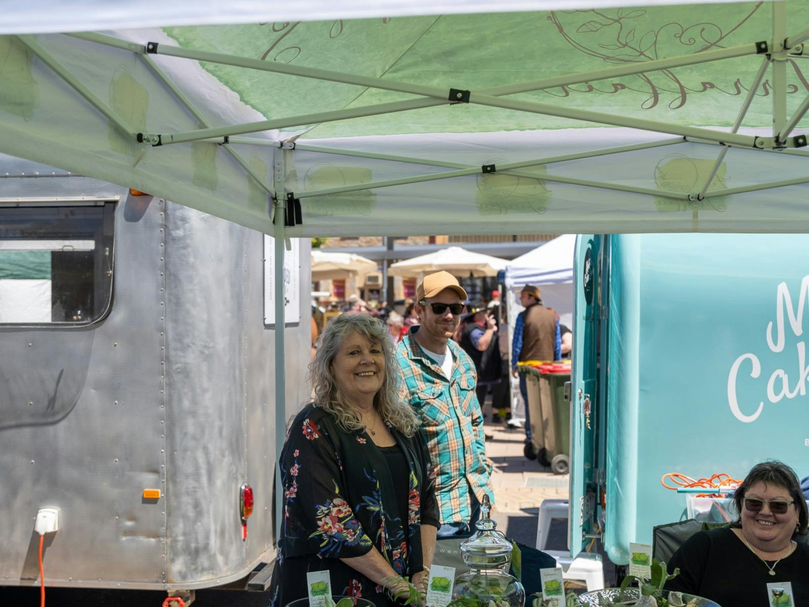 Stall holder smiling at the camera at the Kapunda Markets