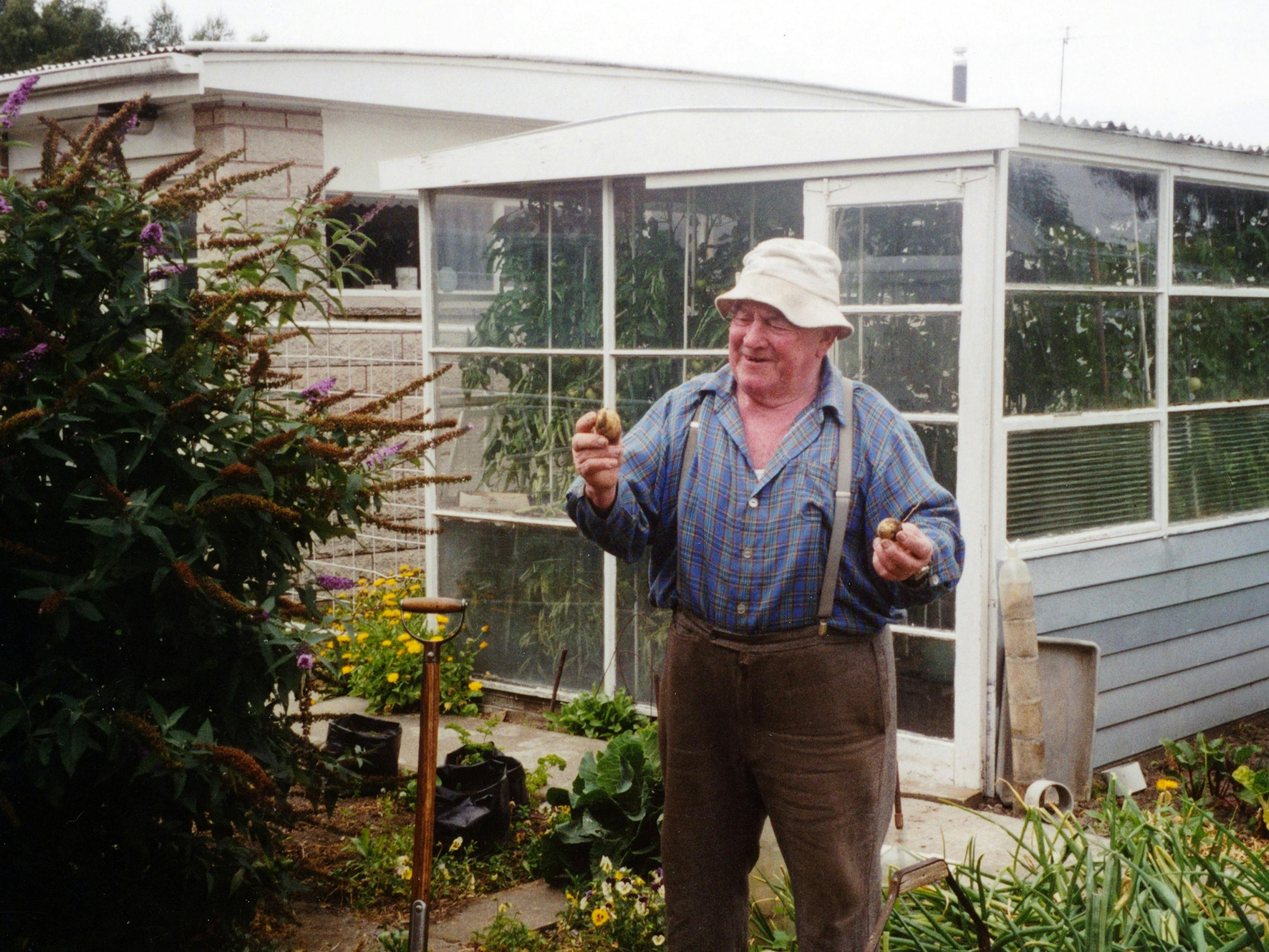 Granddad Jack in his beloved garden and by his Greenhouse.