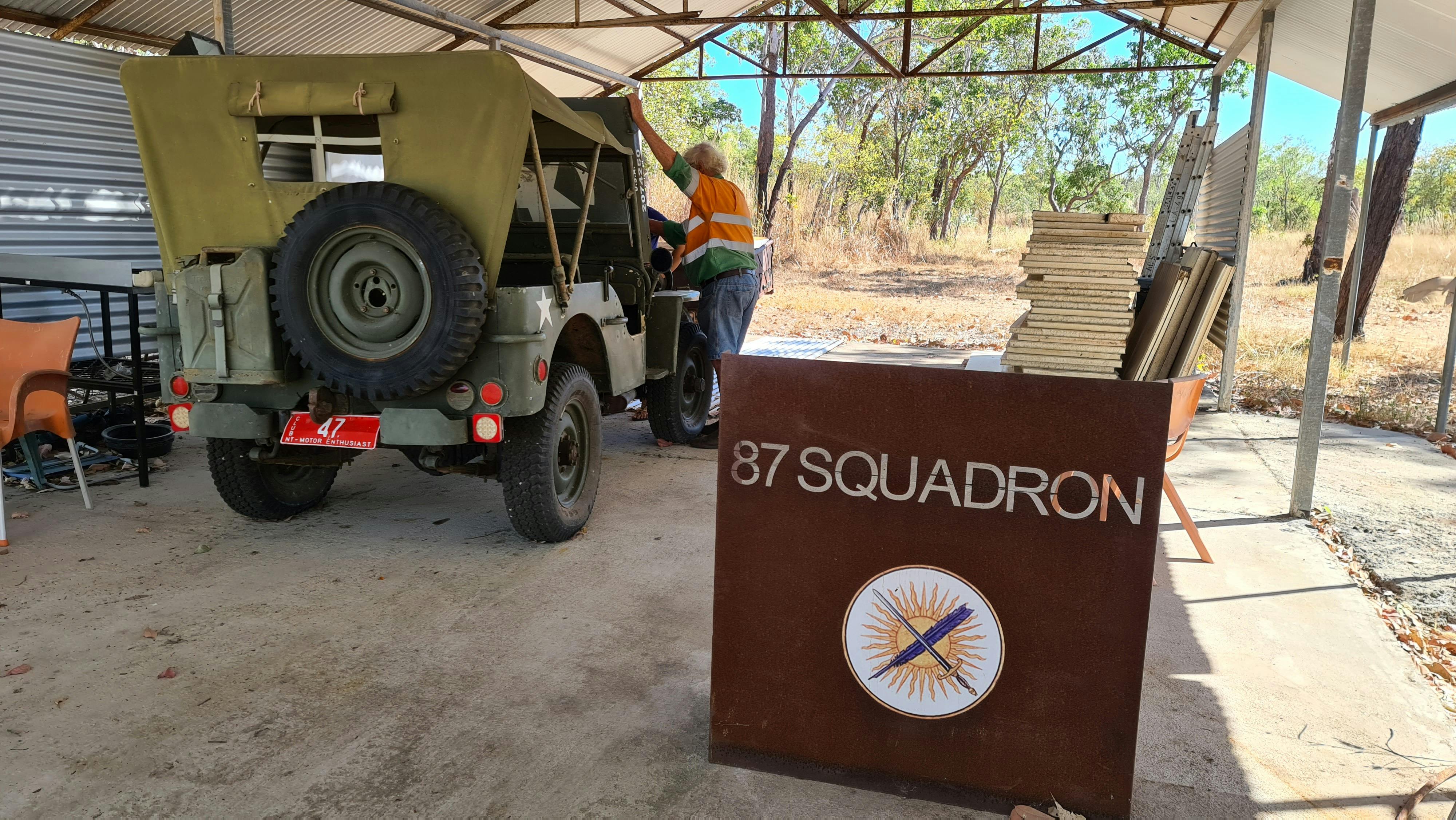WWII Willis Jeep and Squadron Sign