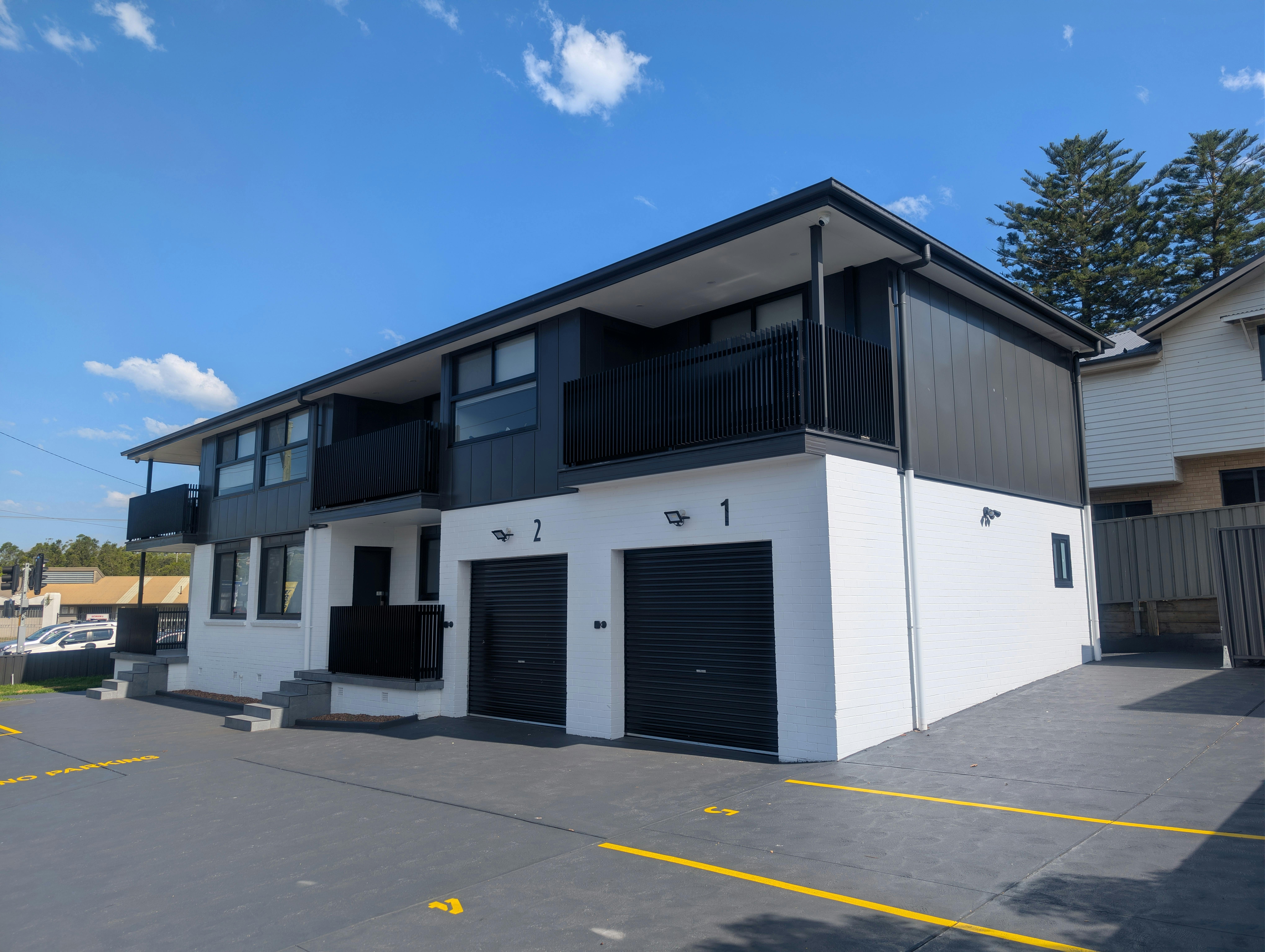 The Car Parking spaces for the One Bedroom with Balcony apartments, with the secure garages behind.