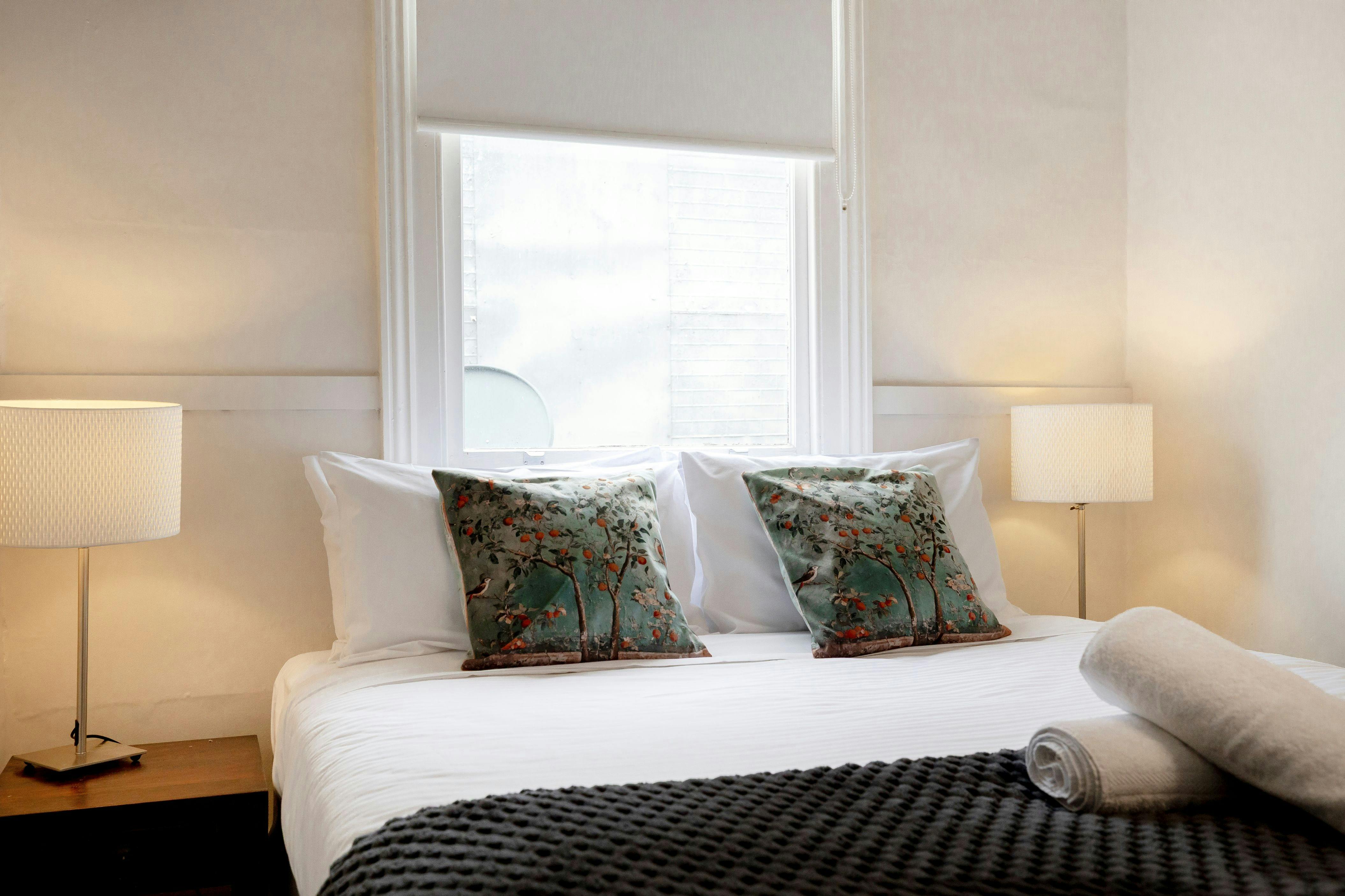 We have Queen rooms upstairs with a shared bathroom down the hallway