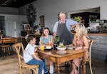 Family enjoying a meal at The Ten Mile in Holbrook