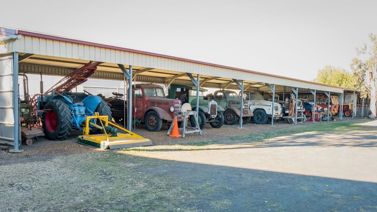 A number of vintage cars and machinery on view.