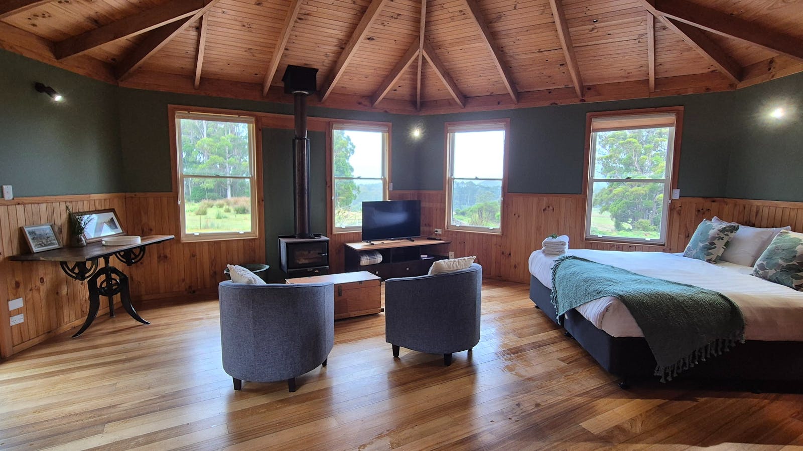 Cottage interior with fireplace, smart TV and views