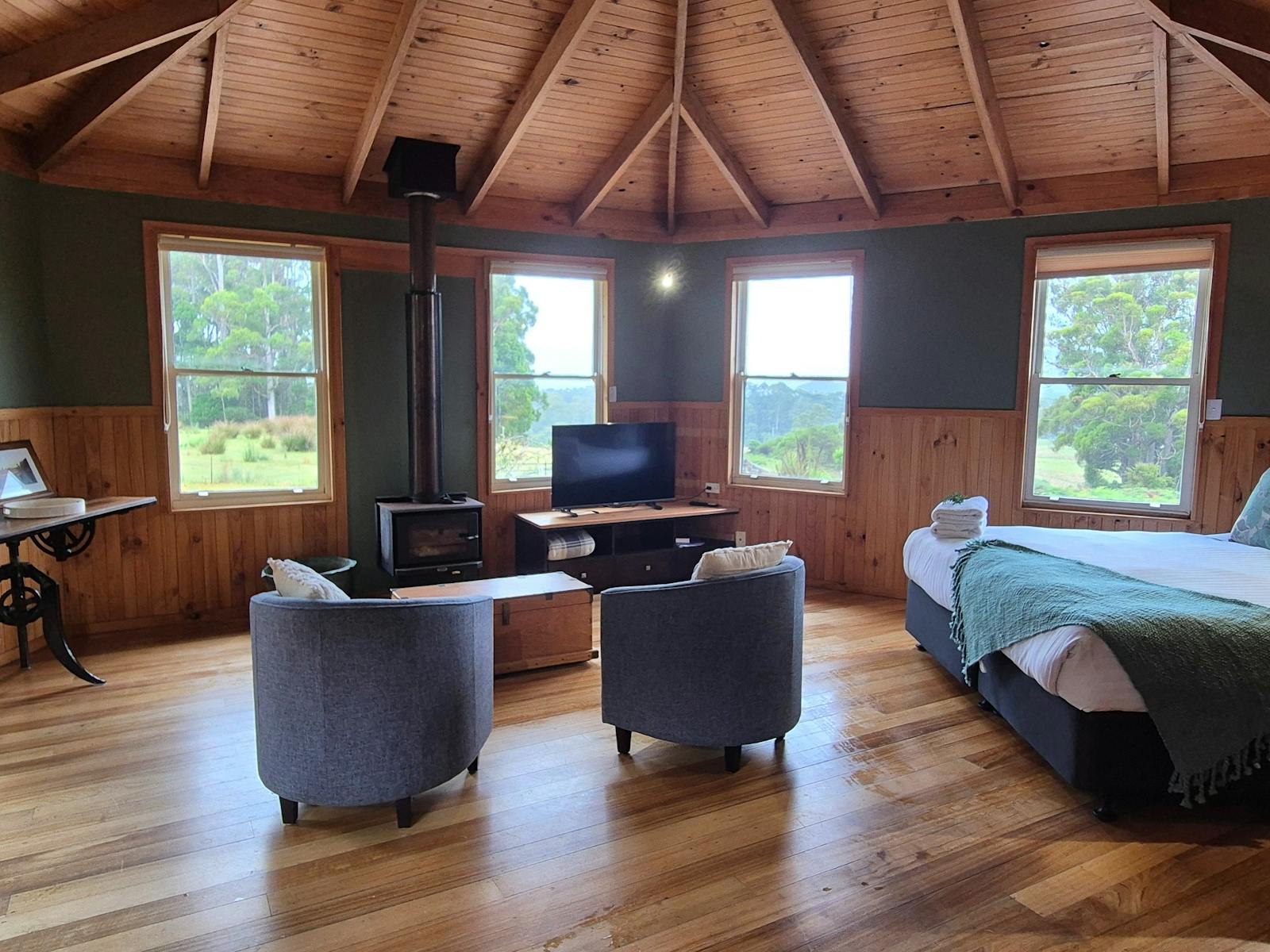 Cottage interior with fireplace, smart TV and views