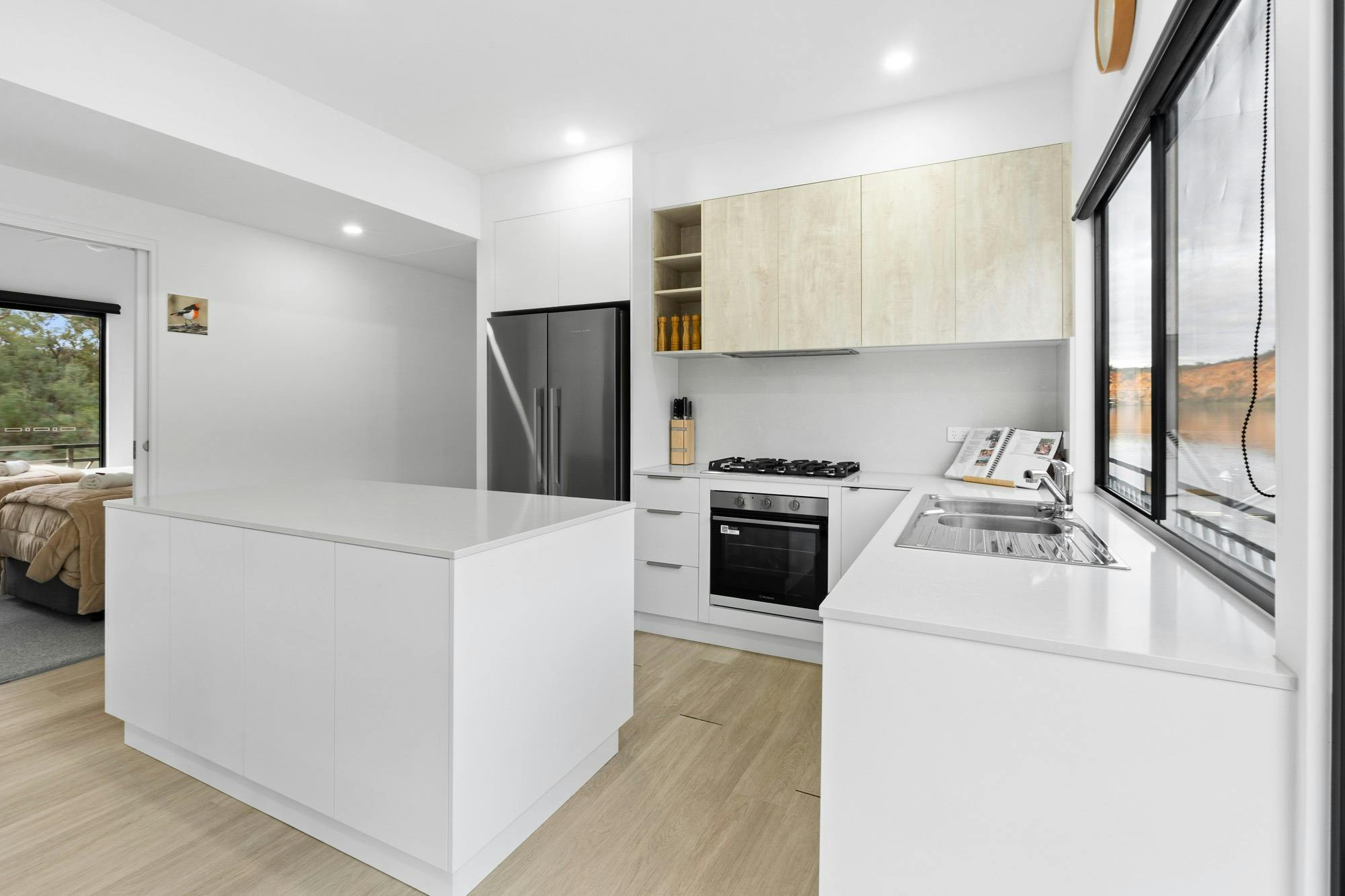 Full kitchen inside the luxury houseboat on the Murray River