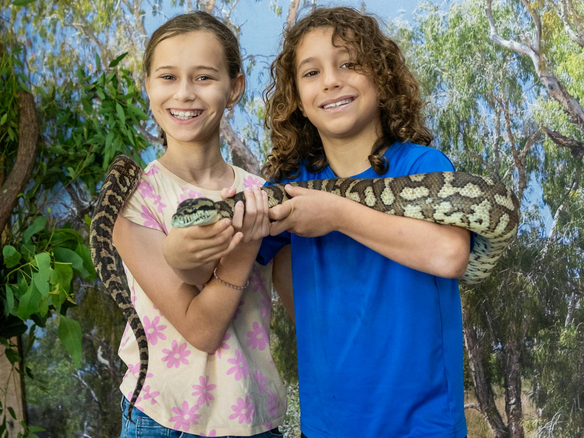 Take the opportunity to purchase an optional Python holding photo. Additional cost applies. Take the opportunity to purchase an optional Python holding photo. Additional cost applies.