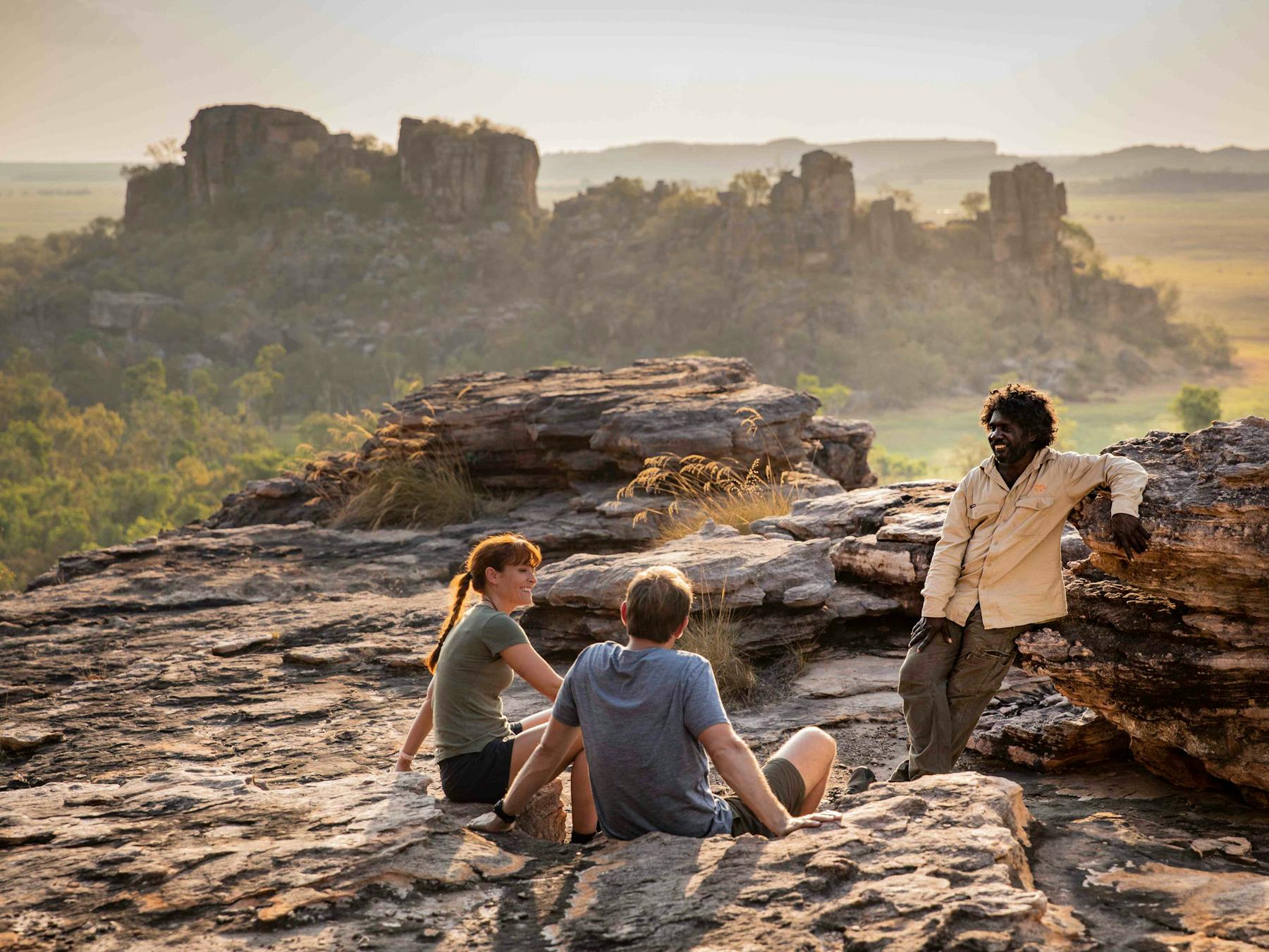 Visitors looking over the Kakadu landscape with an Aboriginal guide from Kakadu Cultural Tours