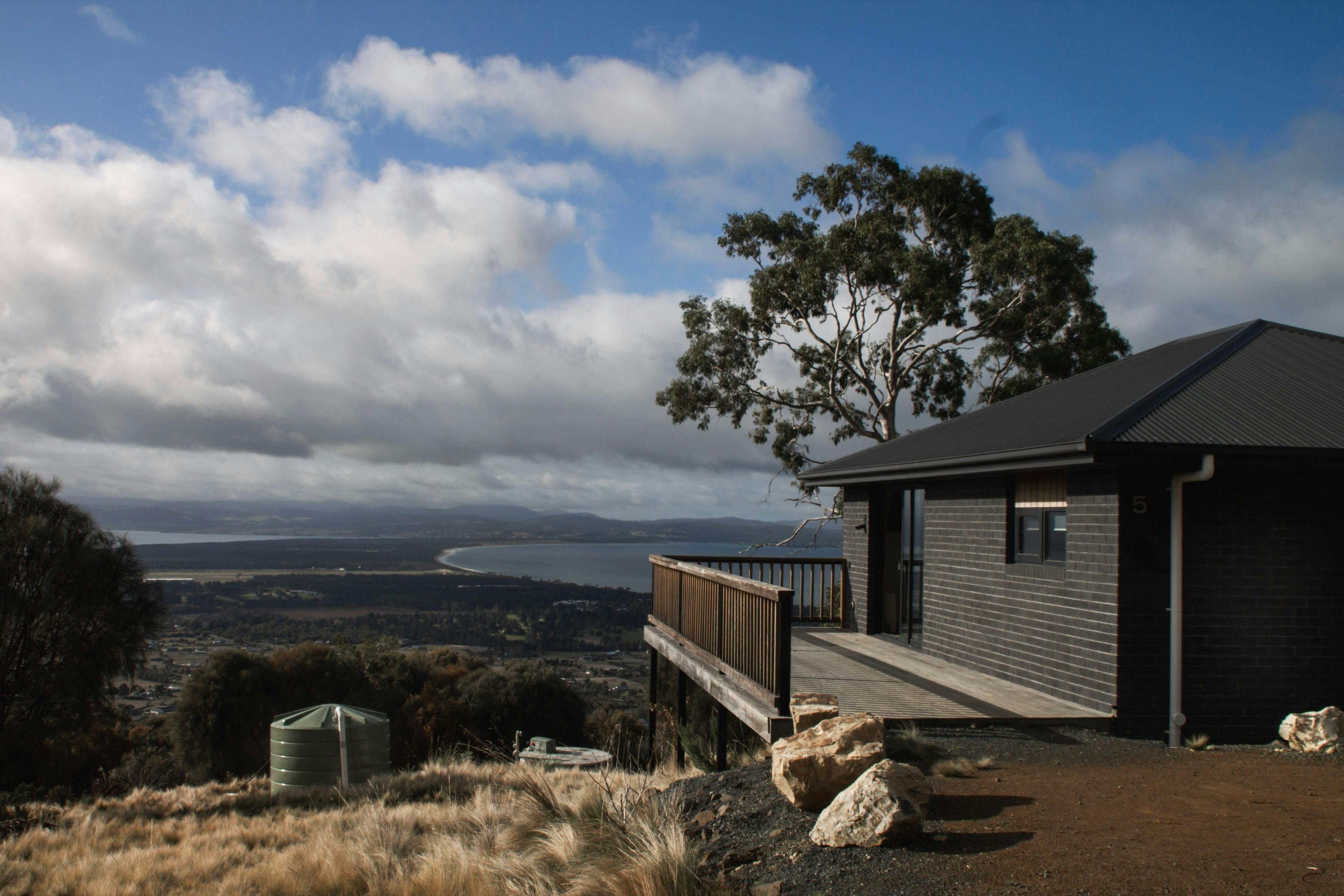 Exterior of Kangaroo House with private deck overlooking the surrounding landscape