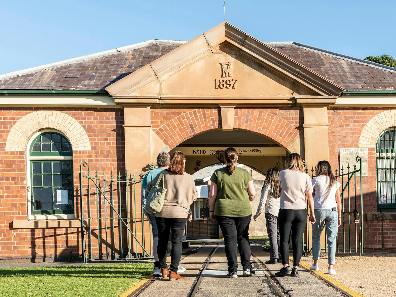 Tour guests standing at Newington Armory Visitor Centre