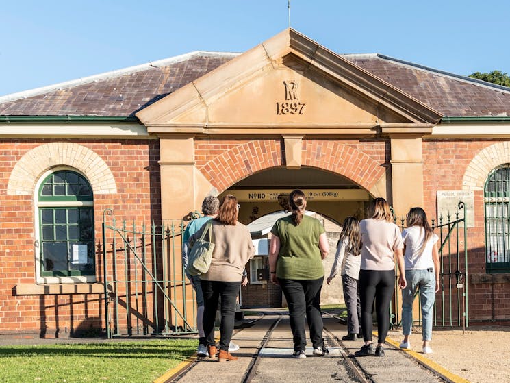 Tour guests standing at Newington Armory Visitor Centre