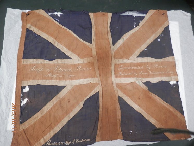 Battered Union Jack flag possibly flown at the siege of Ellands River in 1900 in the Boer Waroer War