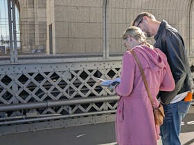 Tourists doing an Unlocked Tour on the Sydney Harbour Bridge