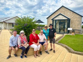 Group wine tour through Coonawarra enjoying cellar doors, premium wines and regional produce.