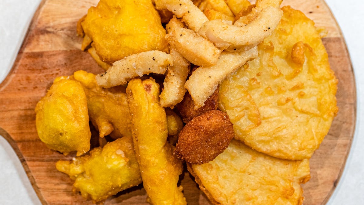 Deep fried seafood on a wooden board