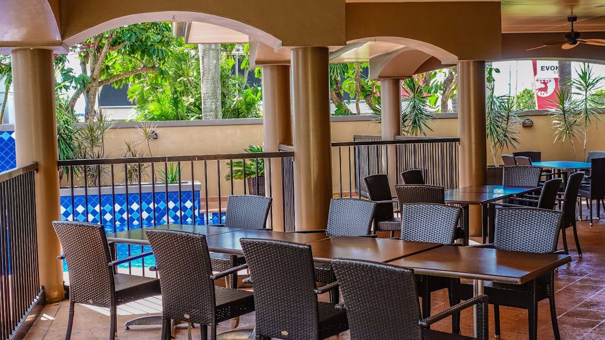 Blue Gecko Bar and Restaurant opens out to the pool providing alfresco dining