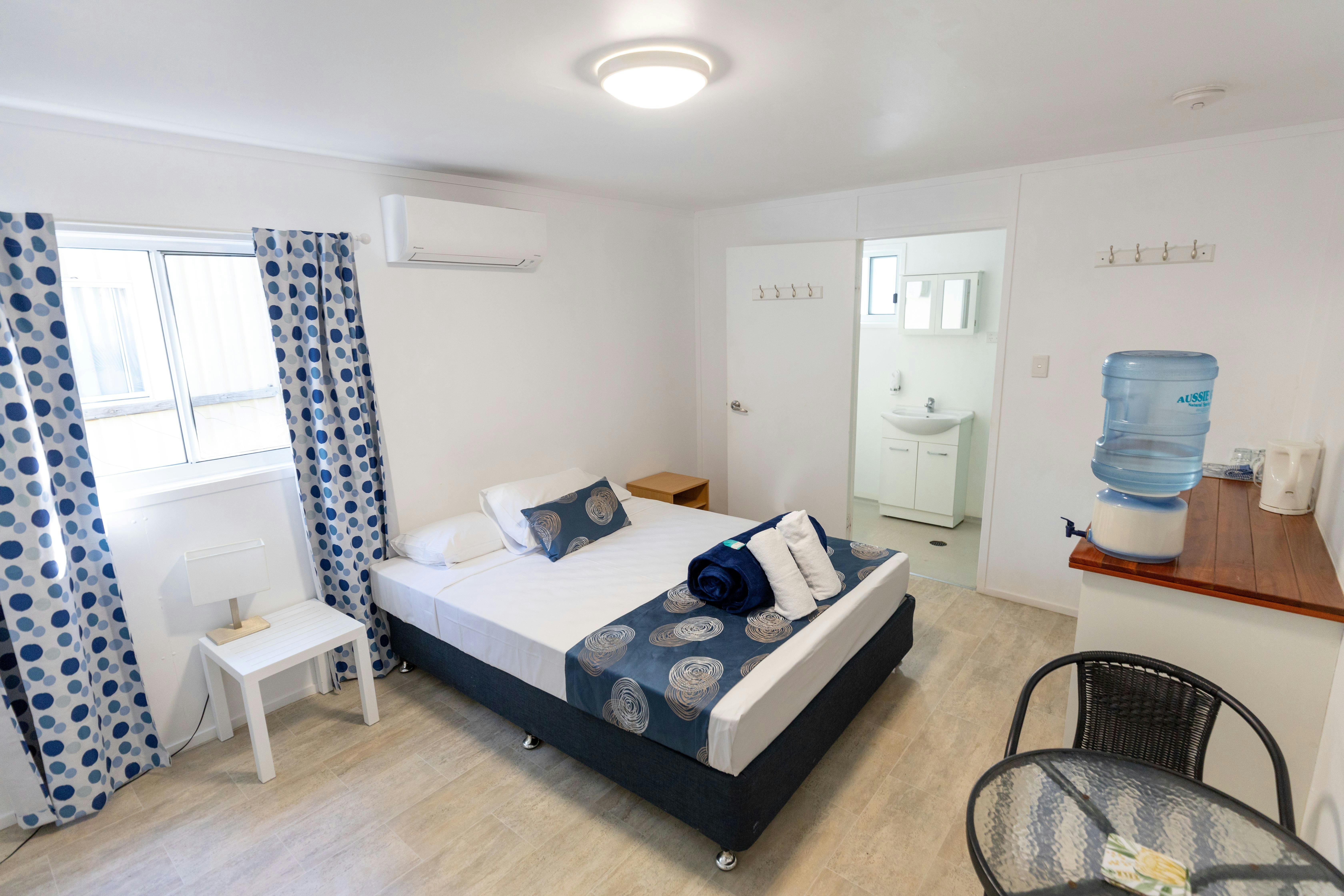 Queen bed & living area