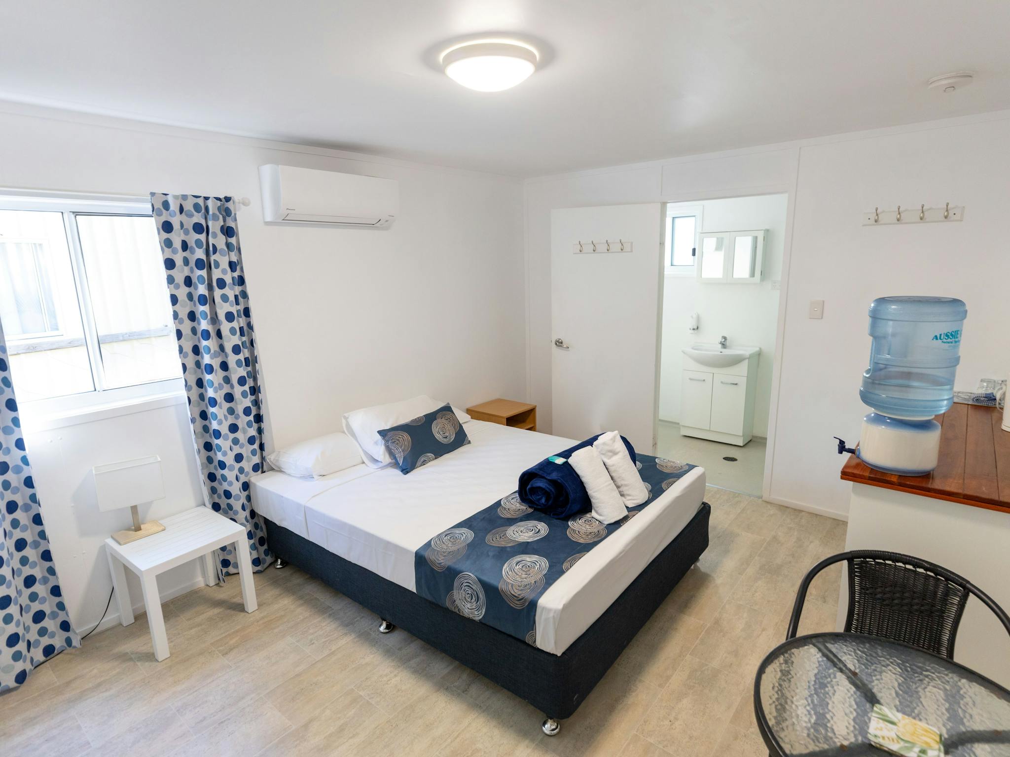 Queen bed & living area Queen bed & living area