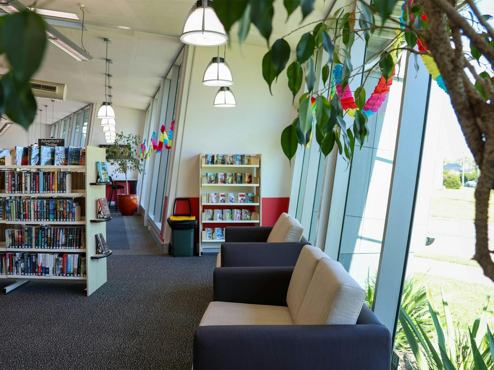 Lounge seating at Singleton Library in front of large windows