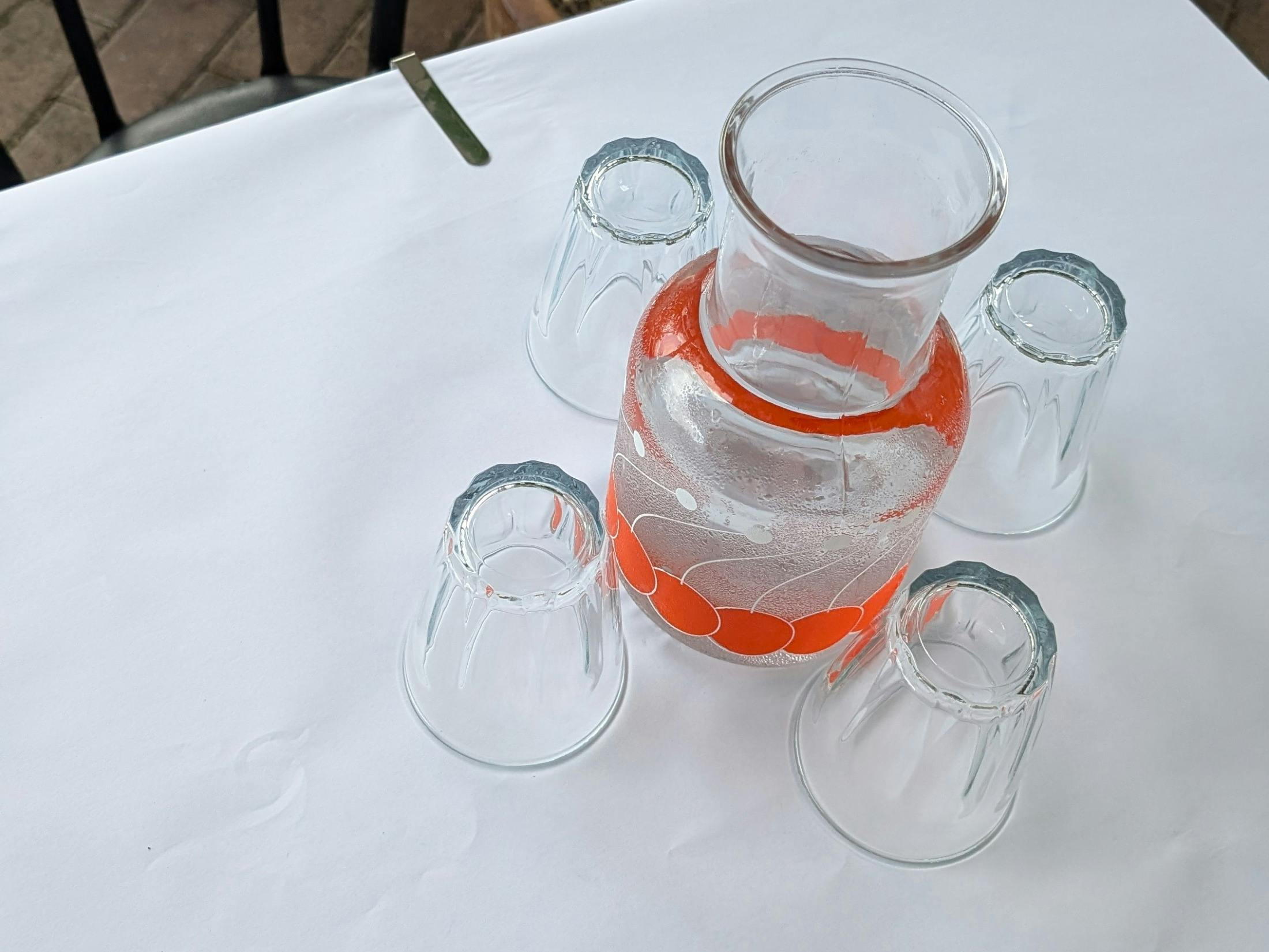 restro water jug and glasses