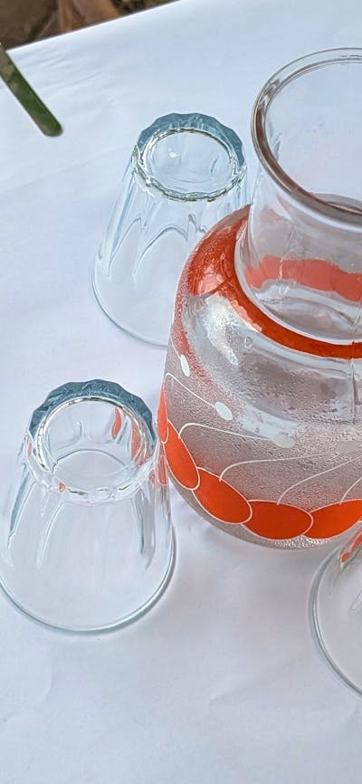 restro water jug and glasses
