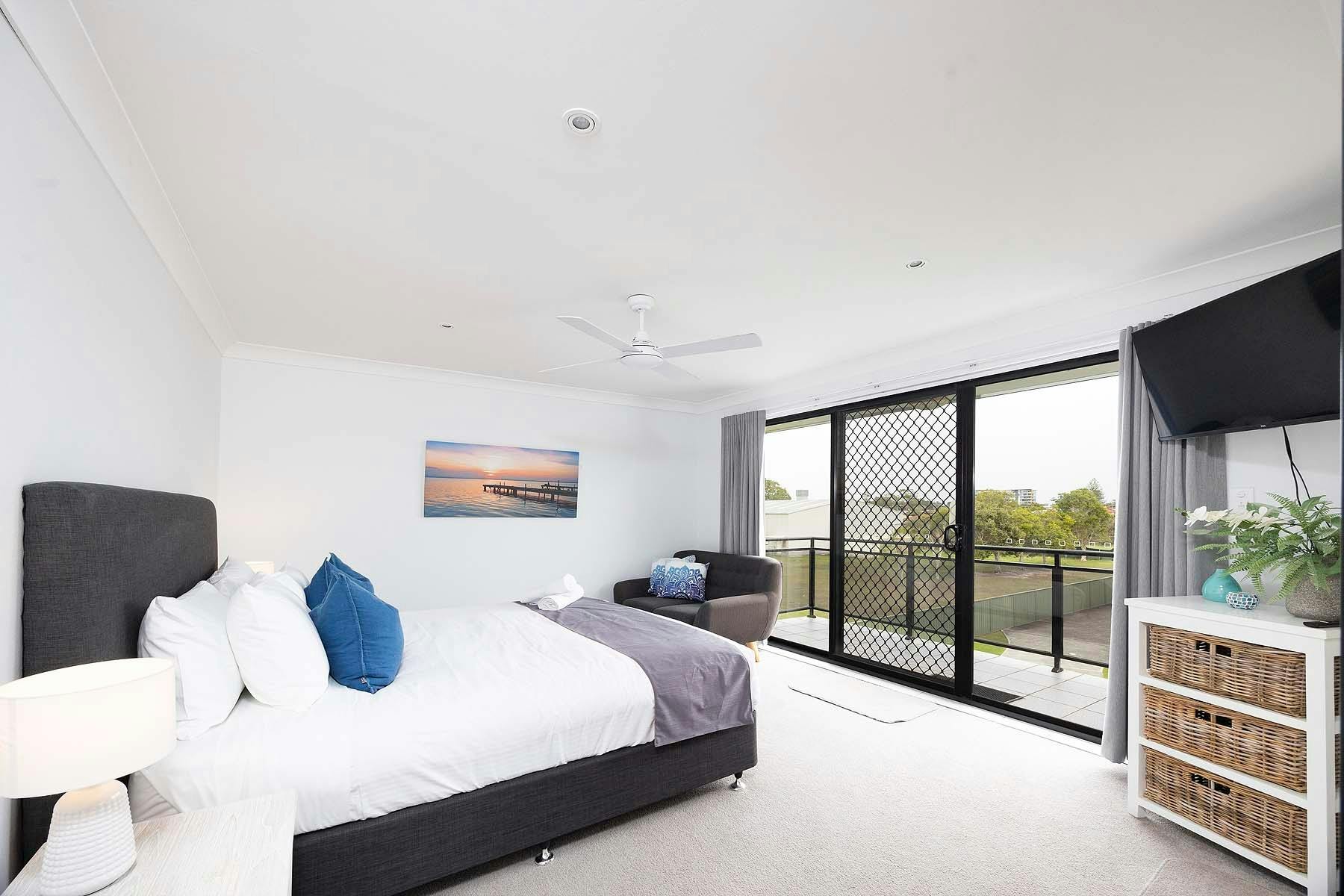 Master bedroom with balcony access