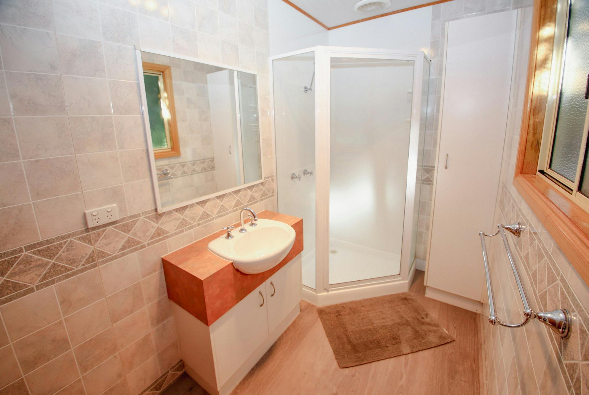 Image of bathroom in Cabin with shower and vanity