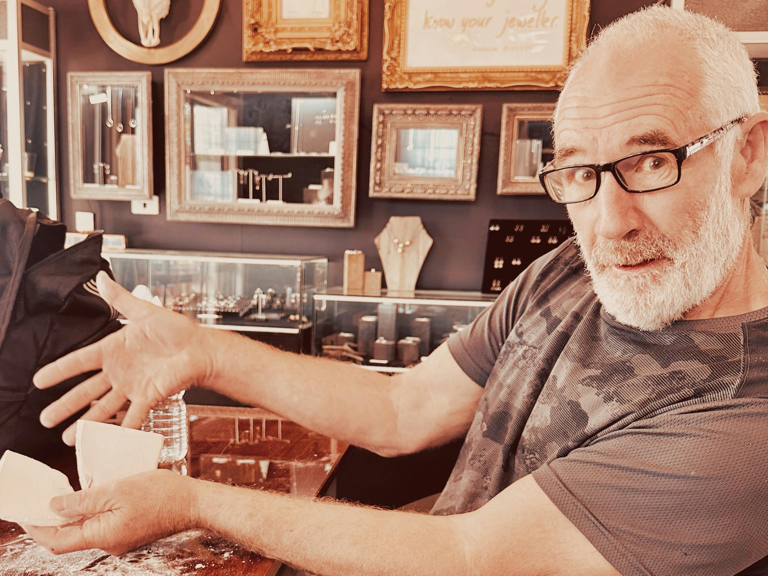 Shanyn Linklater Jewellery workshop attendee holds up cuttlefish mould with pride