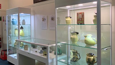 Image of display cabinets with electric jug collection