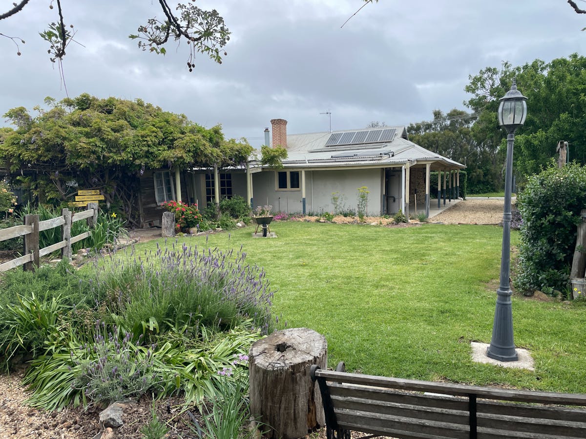 Cottage Garden Road House Back yard view