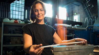 Neon Glass Artist bending glass