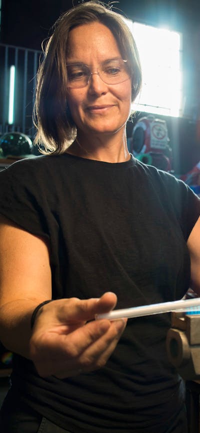 Neon Glass Artist bending glass