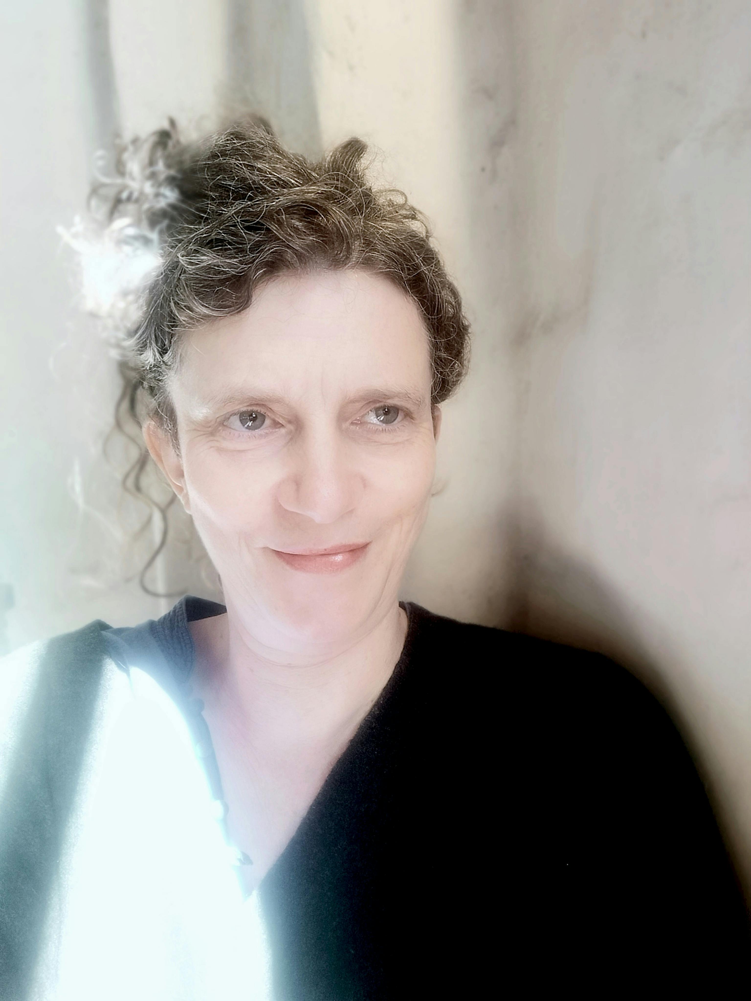 A woman smiling