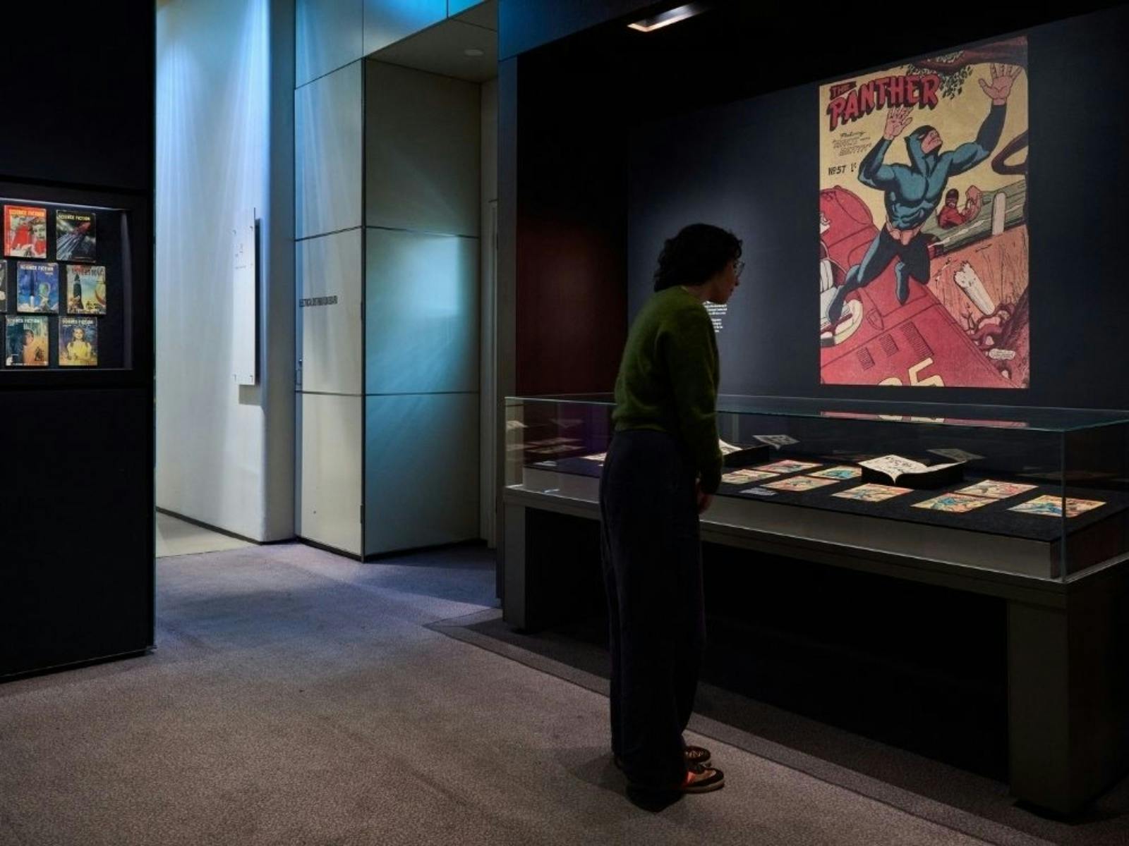 A patron viewing a display at World of the Book