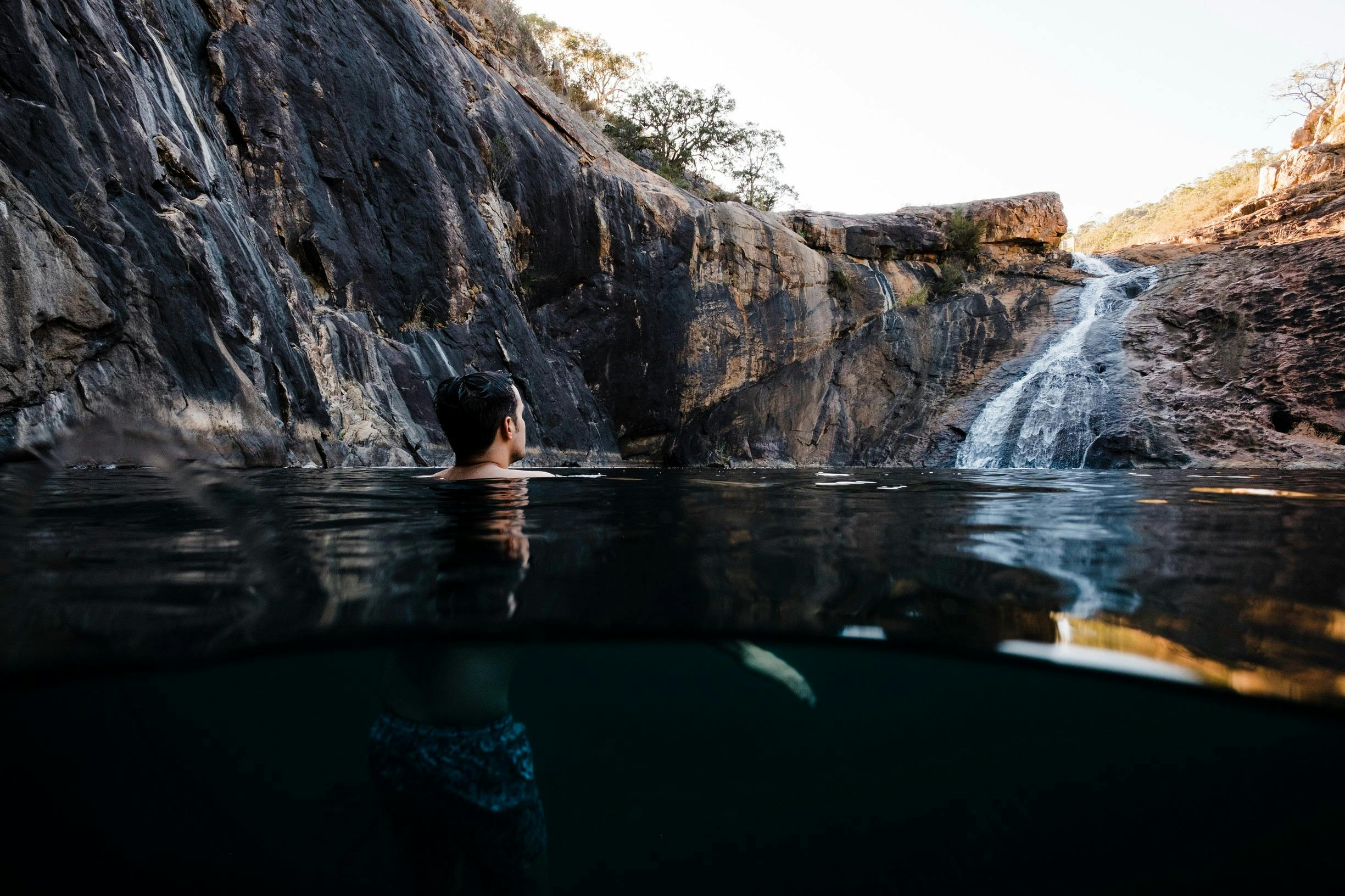 Man swimming at Serpentine Falls