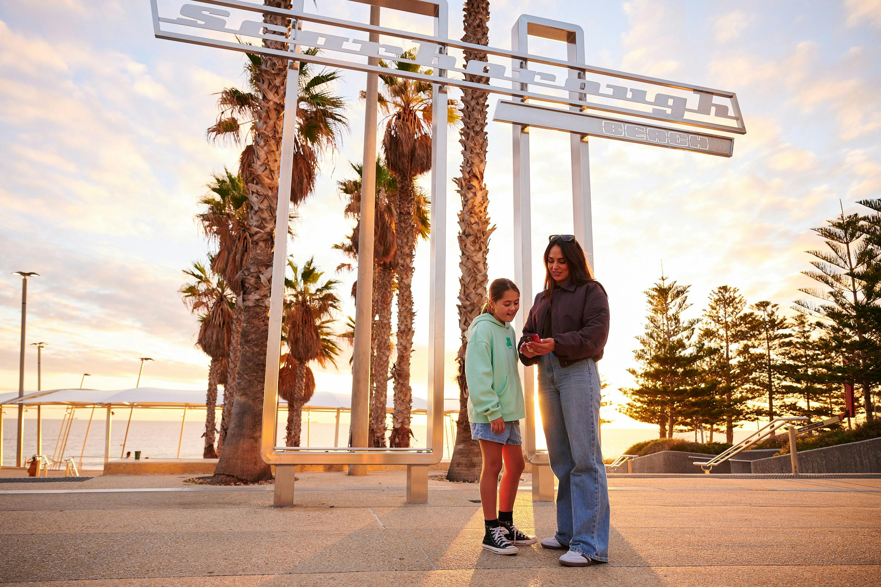 Family checking out the new Scarborough Beach Play Trail