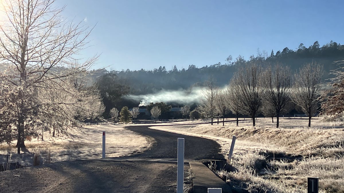 The view up the driveway entrance on a frosty winters morning show quiet and serene our location is The view up the driveway entrance on a frosty winters morning show quiet and serene our location is