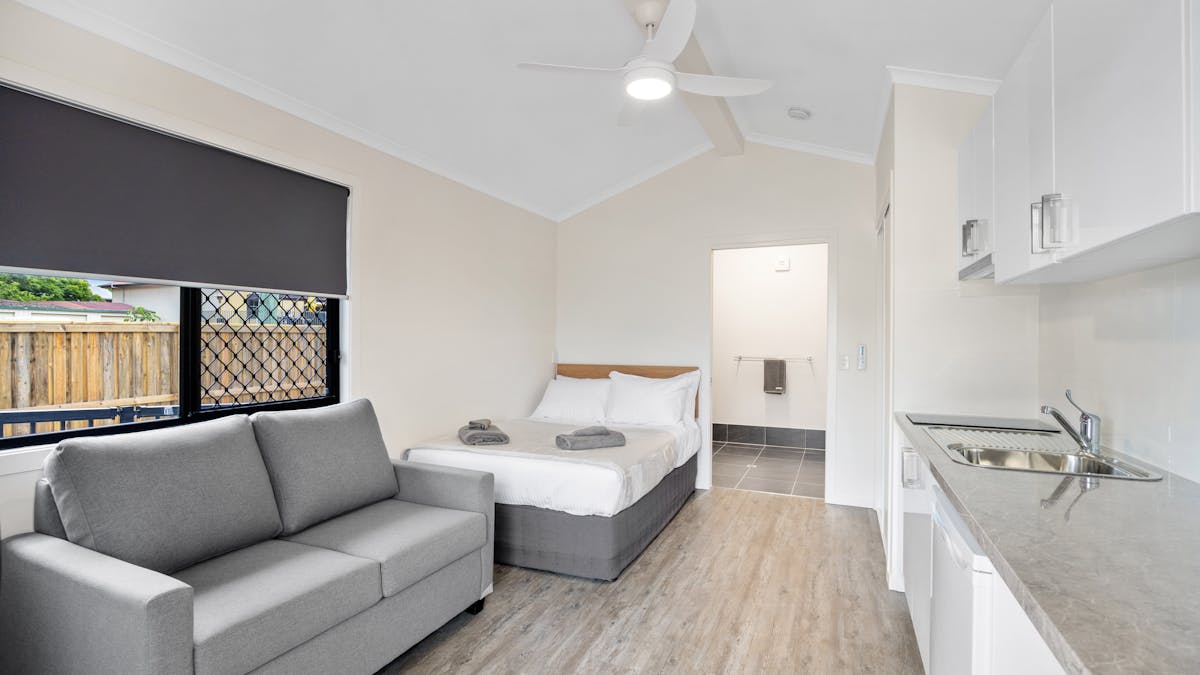 Studio Cabin with accessible entry and double bed. Kitchenette and bathroom