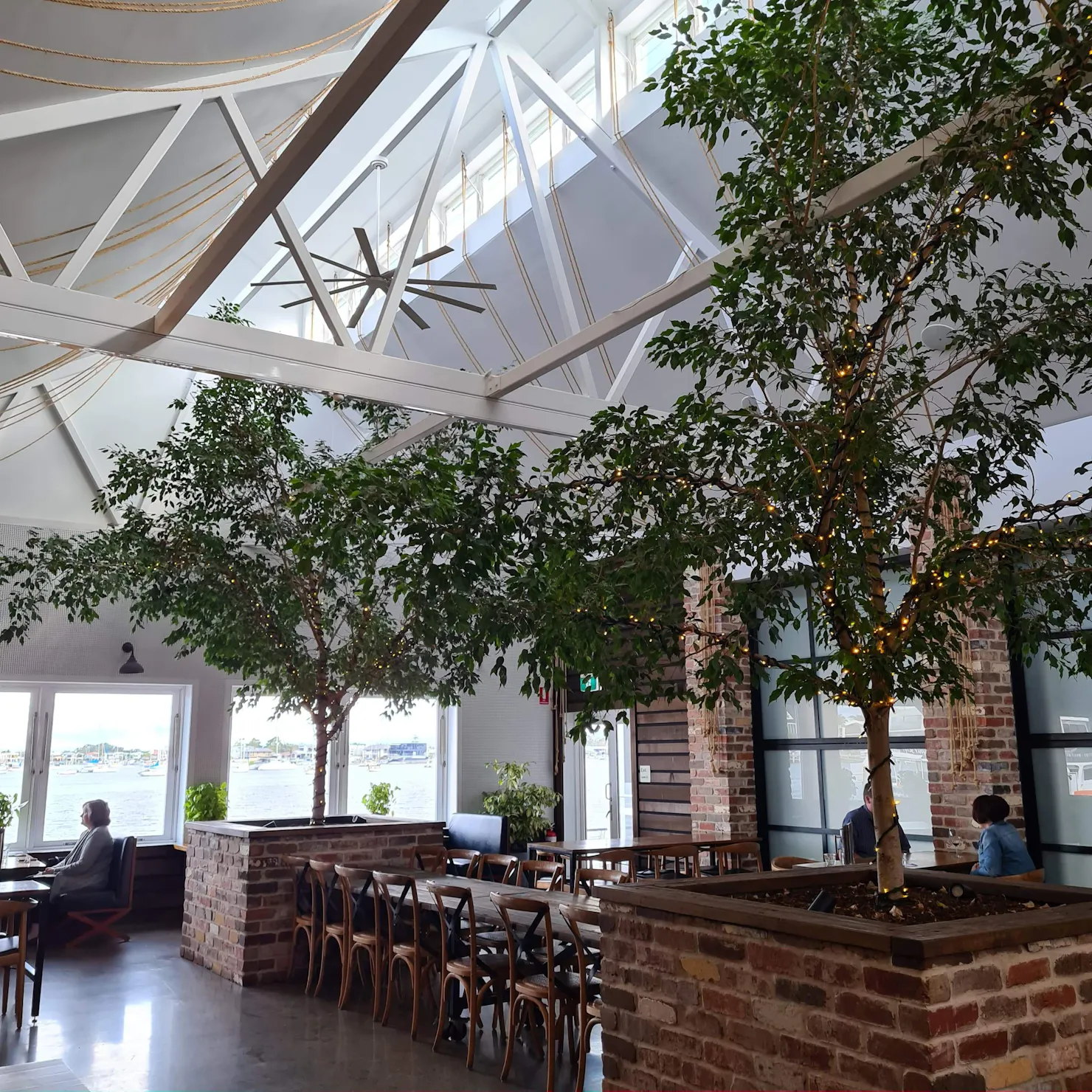 The Dock Mooloolaba's light bright riverside main dining room