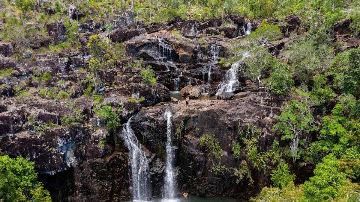Aerial view of the water falling along the many rockpools into a waterwhole